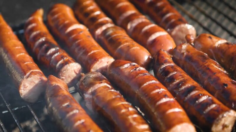 Traditional German Bratwurst sausage on the grill
